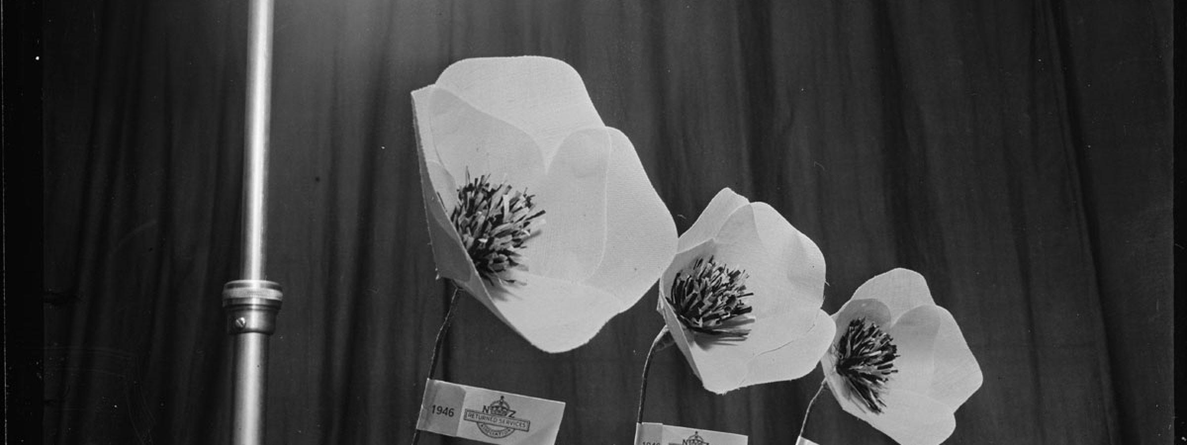 Artificial poppies for sale for Anzac Day photographed circa 23 April 1951
